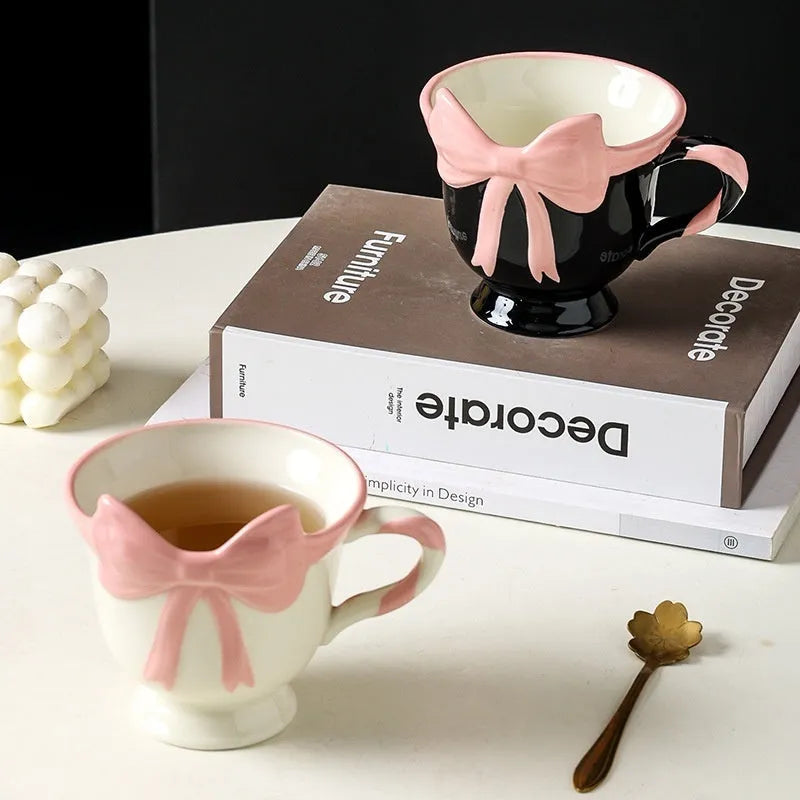 Ceramic mug with girl heart bow design in black pink or white powder colour, 301-400ml capacity