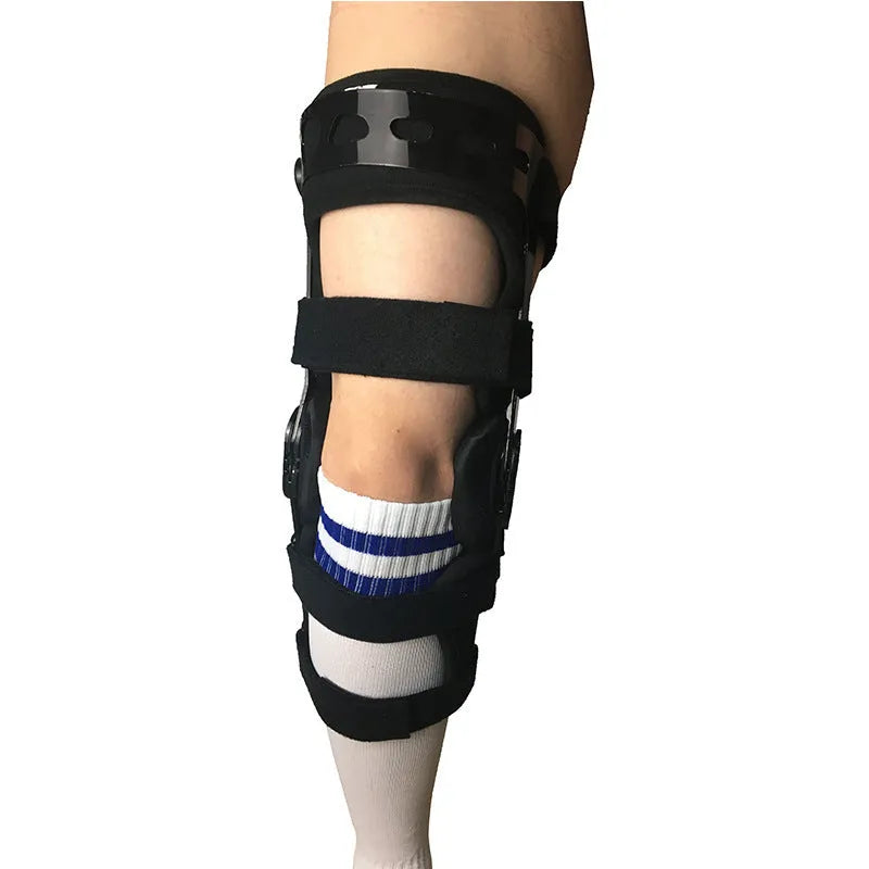 Black anterior ligament knee pad with adjustable straps and side stabilisers