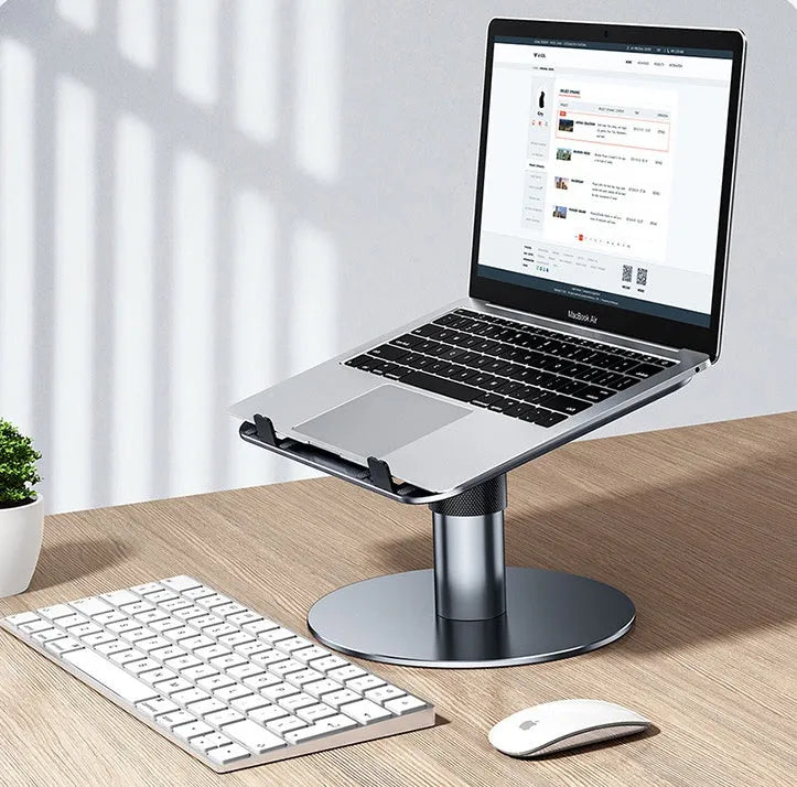 Silver aluminium laptop stand with height adjustment and rotating base for car use