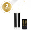 Four black LED taper candles with realistic 3D flame effect, showing flickering yellow light
