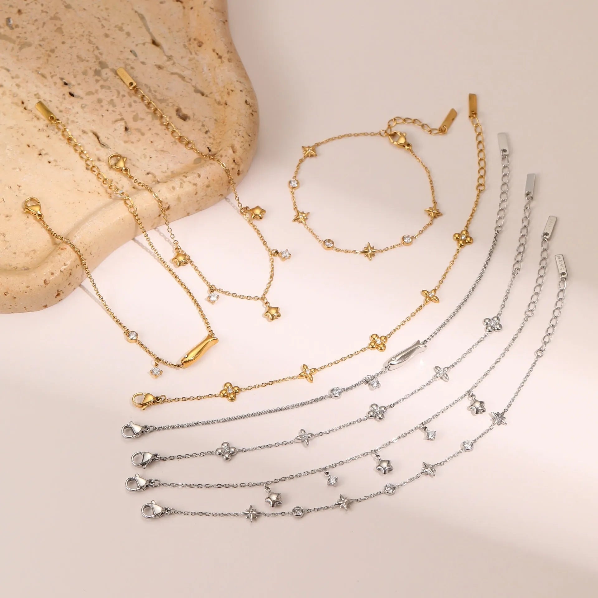 Ins women's gold-plated stainless steel bracelet with a geometric hexagonal star zircon pendant.
