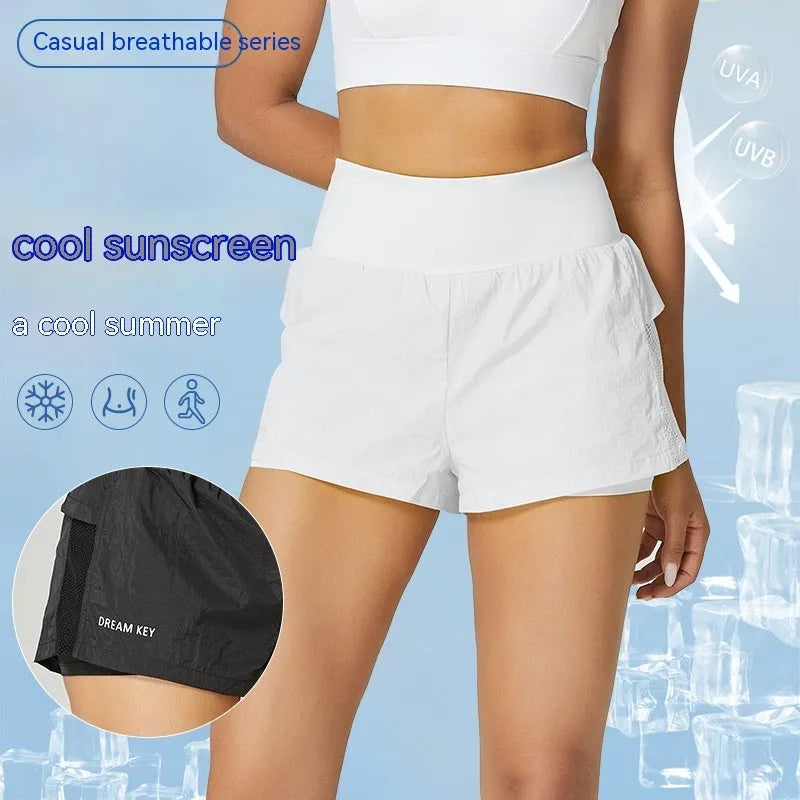 Women's loose cotton blend quick-drying sports shorts in lemon yellow colour.