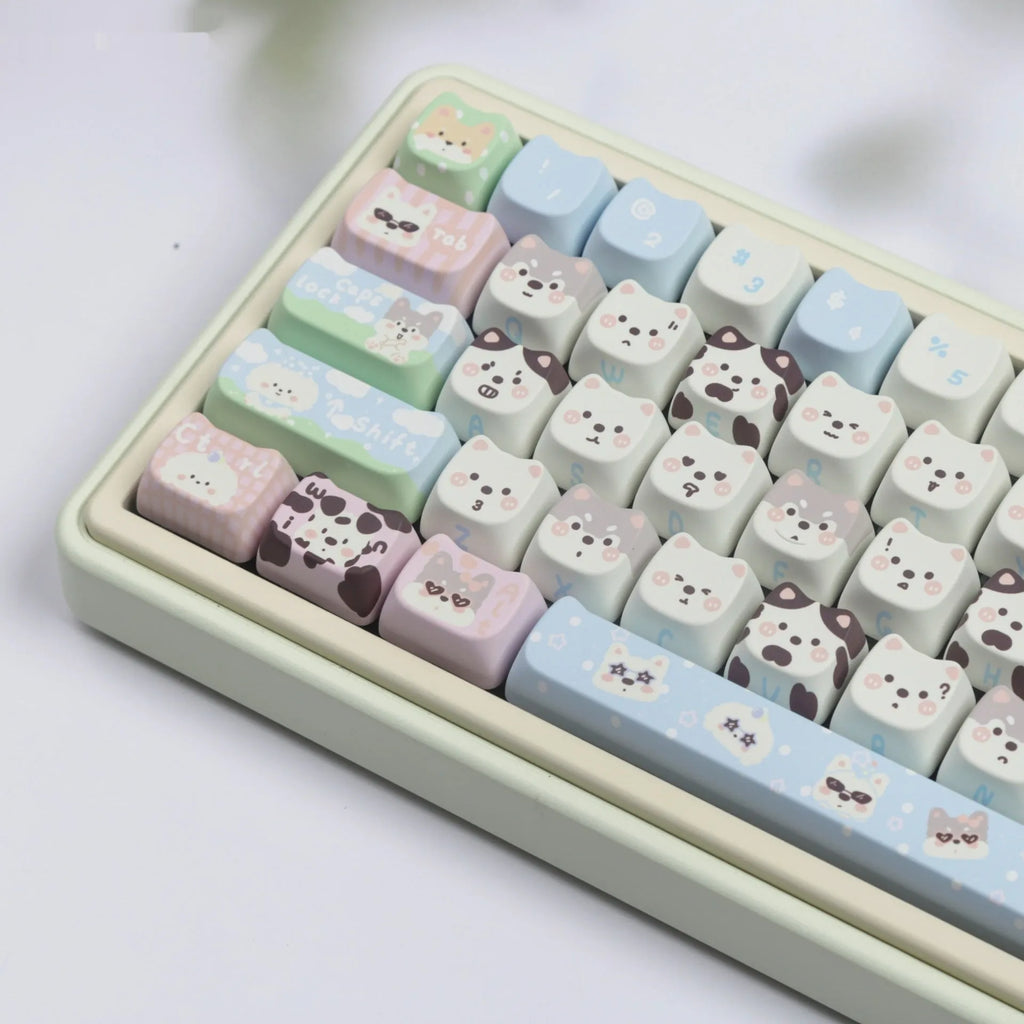 Complete set of 127 PBT key caps with sublimated cat and puppy designs for mechanical keyboard customisation