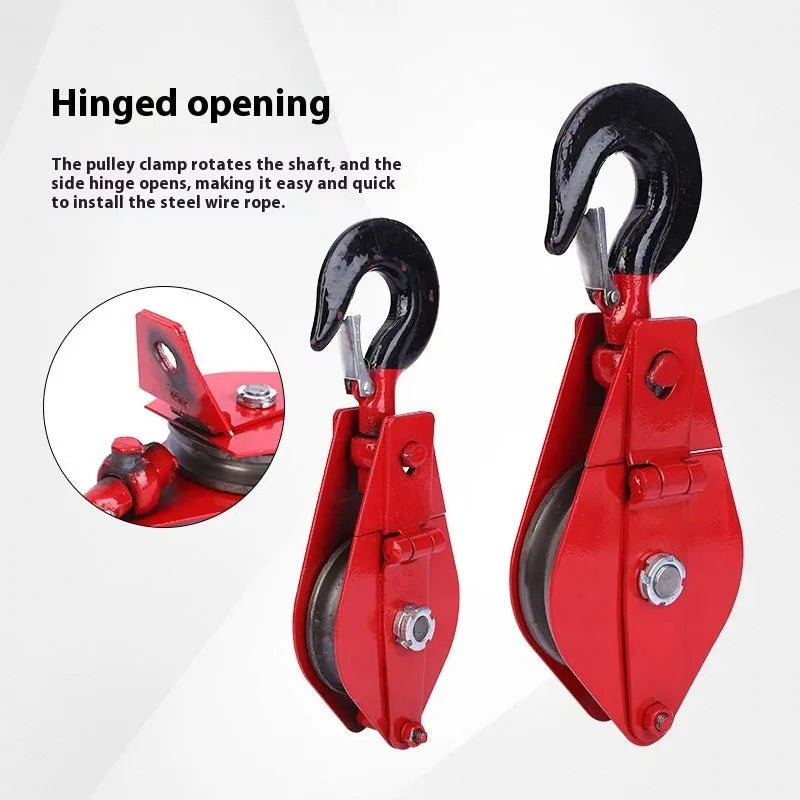 Red steel industrial lifting pulley with a safety latch and large hook opening.