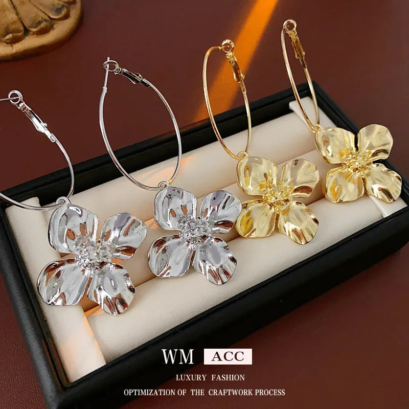 Silver Needle geometric flower design drop earrings in gold or silver electroplated metal alloy