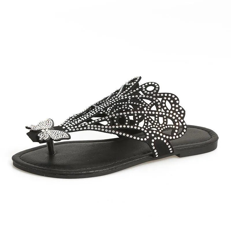 Women's black slip-on sandals with rhinestone decoration and flip-toe design