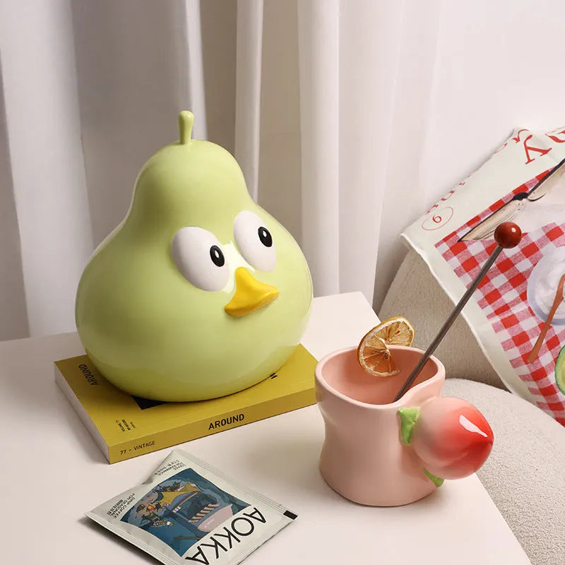 Cute pear-shaped ceramic tissue box holder in white porcelain, available in black or green