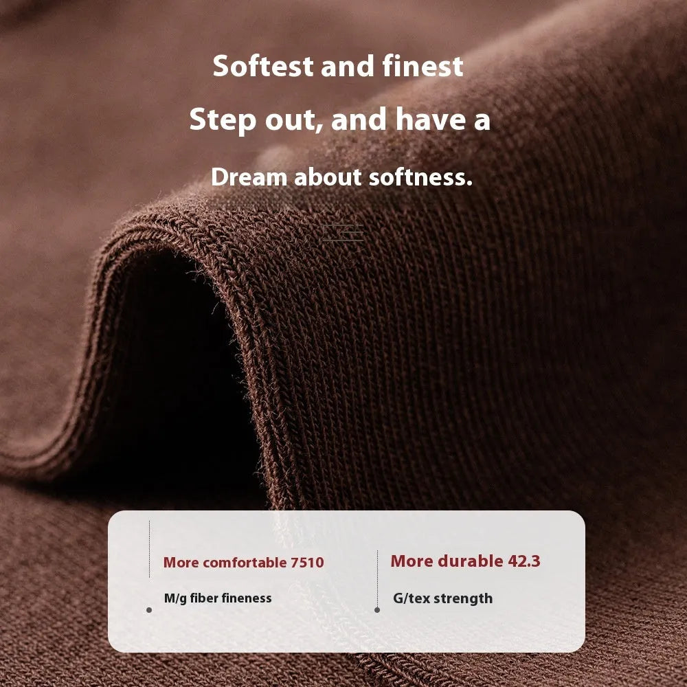 A pair of men's solid colour mid-calf socks made from combed cotton for business wear.