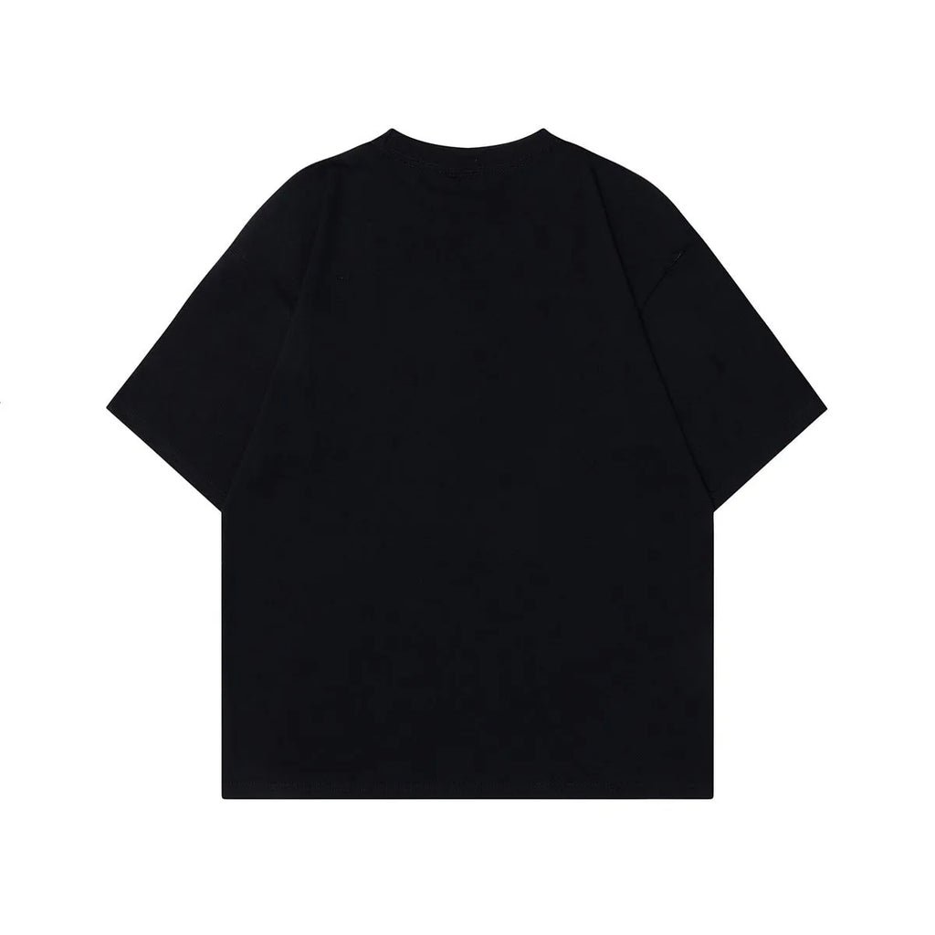 Men's black t-shirt with a retro character print, showing loose fit and short sleeves.