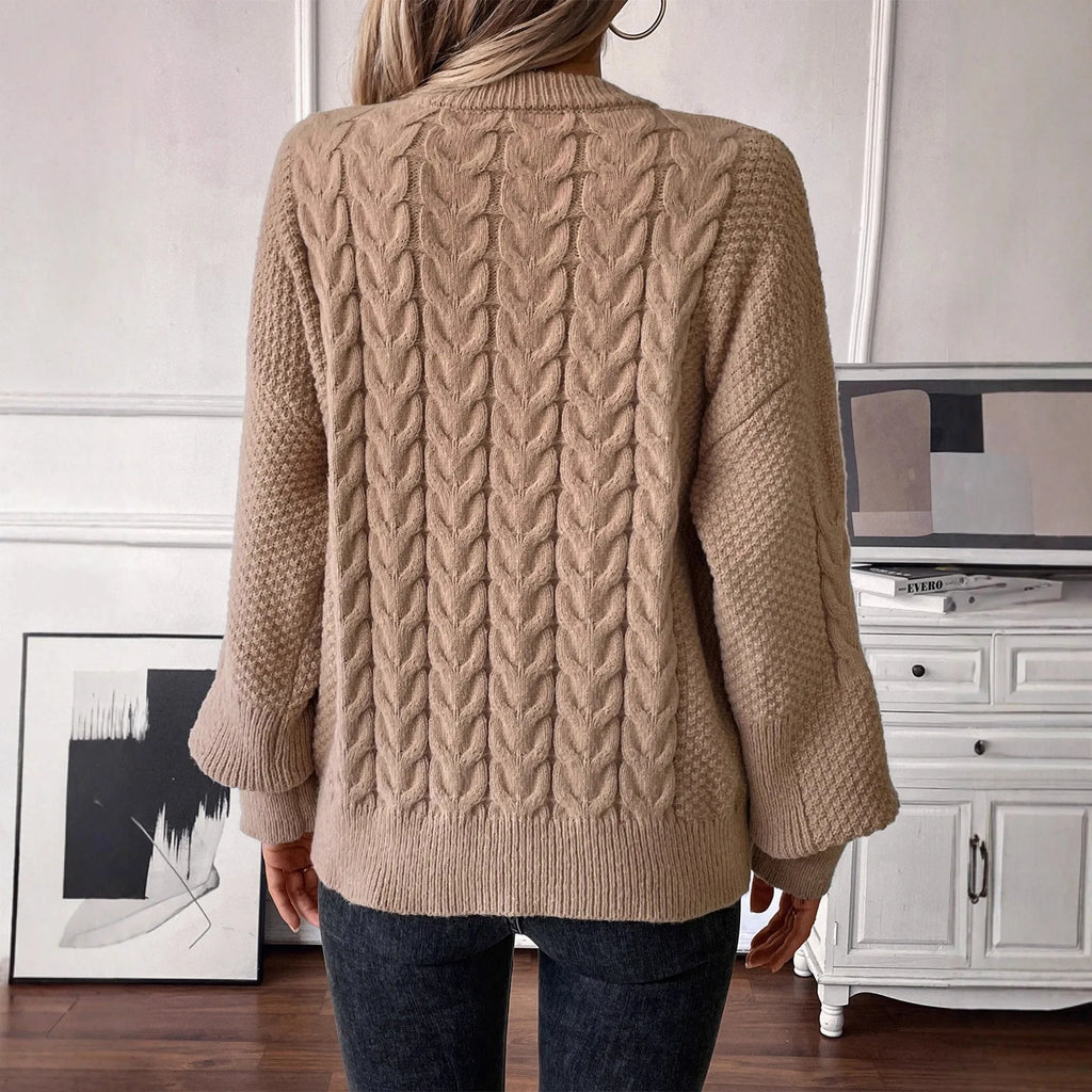 Women's twist design casual sweater in beige colour showing loose fit and round neckline