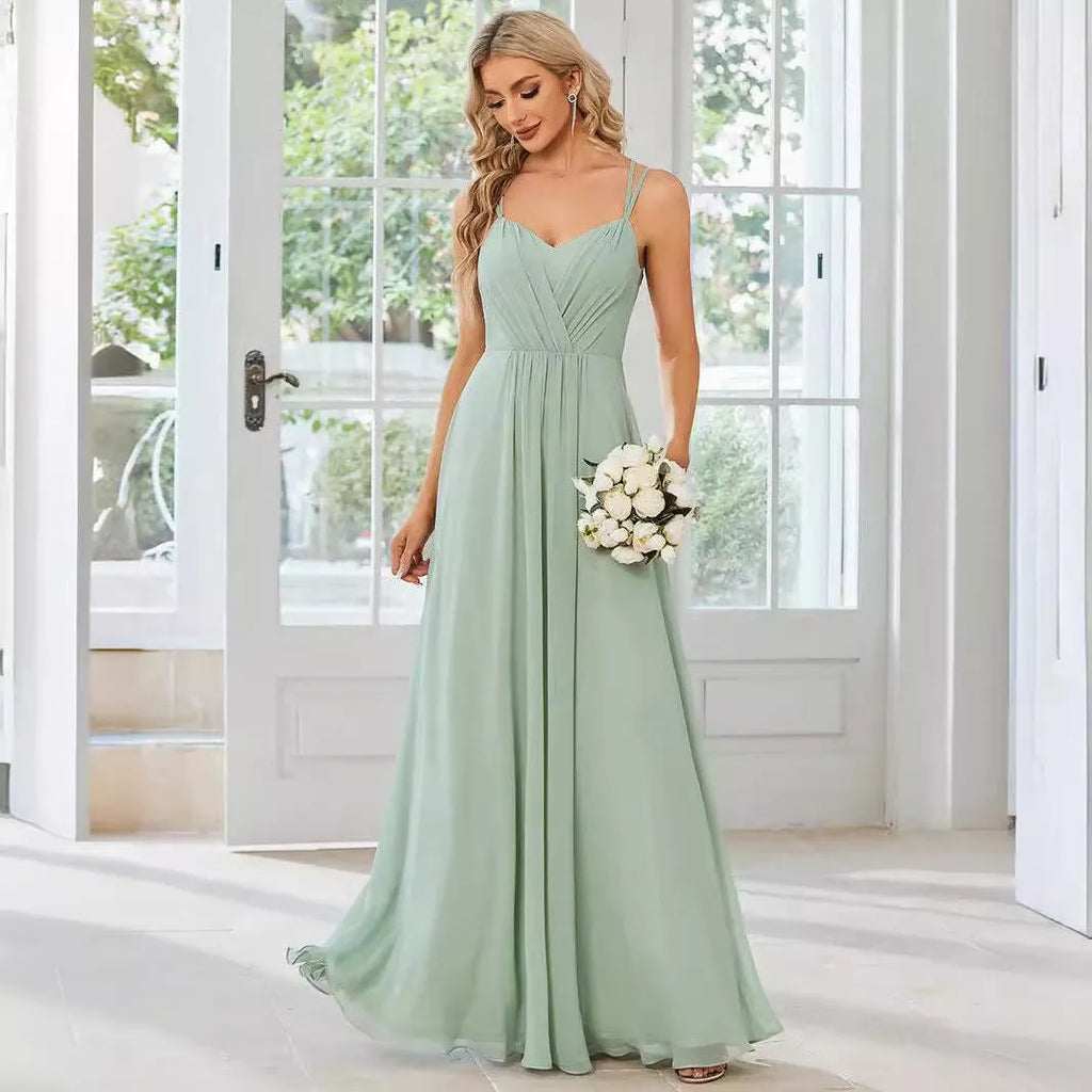 Women's long pleated A-line sleeveless dress in light green polyester fabric