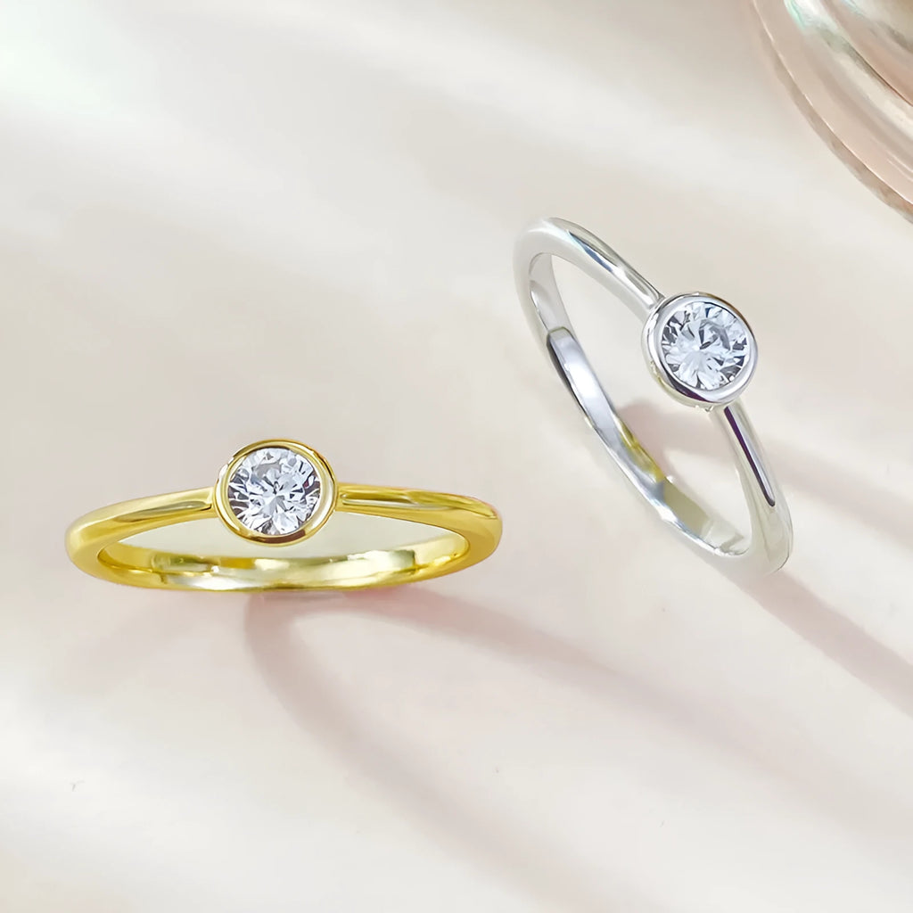 Minimalist silver crown ring with linear design in R962 gold or platinum electroplate finish.