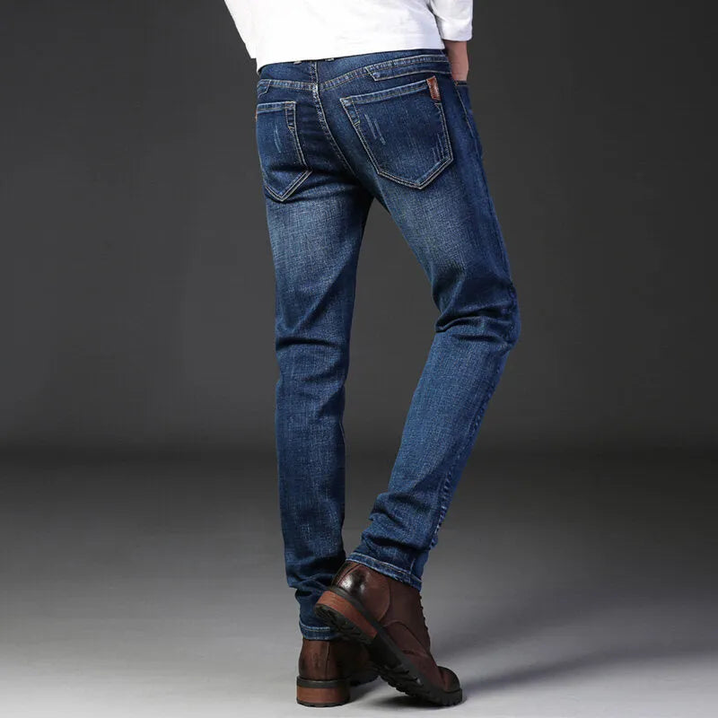 Men's straight stretch slim fit casual denim trousers in blue, cotton fabric, low waist, zipper fly