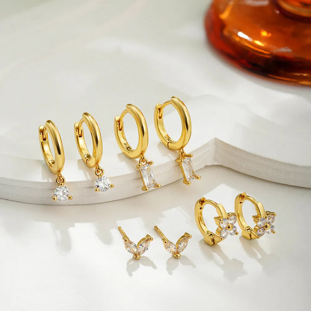 Geometric square zircon earrings four-piece set with gold electroplated finish showing star and quadrilateral designs