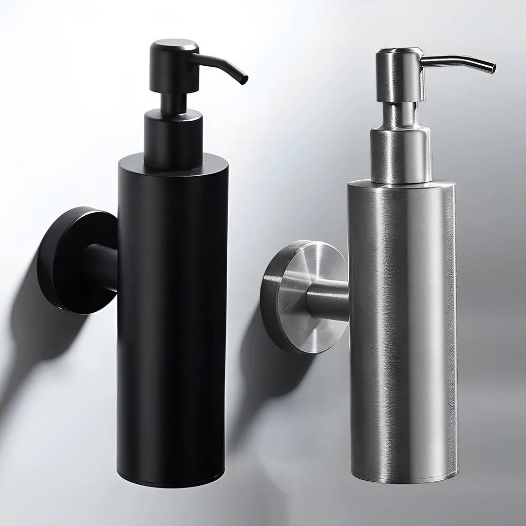Stainless steel wall-mounted manual soap dispenser in brushed finish