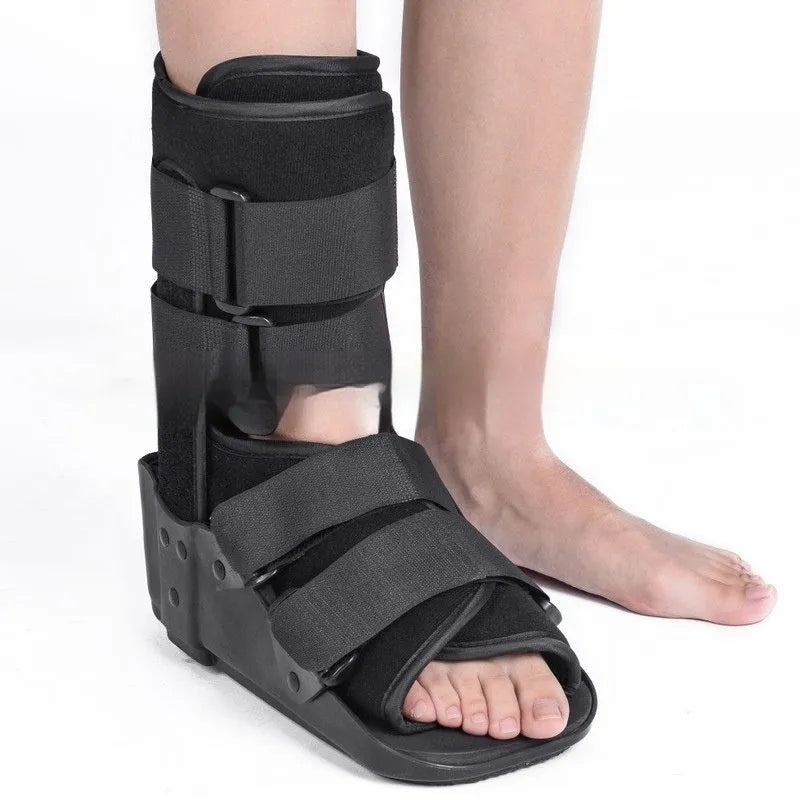 Grey achilles tendon rehabilitation boot with adjustable aluminium support plate