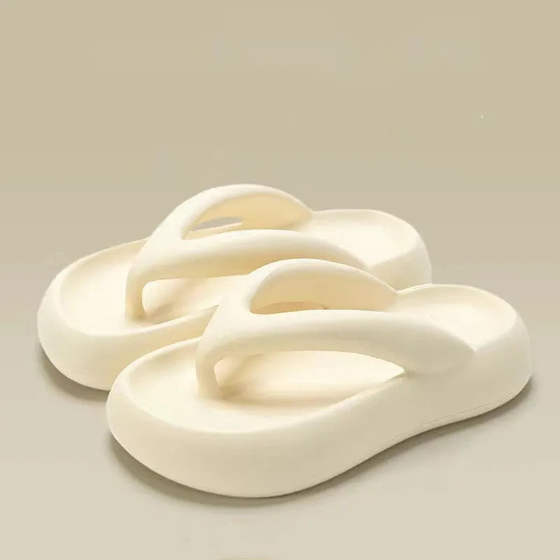Thick-soled EVA flip-flops in multiple colours with a bow detail