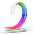 White swan shaped desktop lamp with wireless charging pad, Bluetooth speaker, and colourful LED lighting