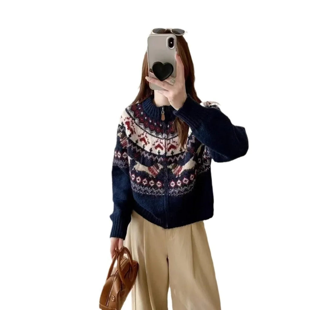 Ethnic style beige apricot jacquard pullover sweater with 3D pattern on a hanger.