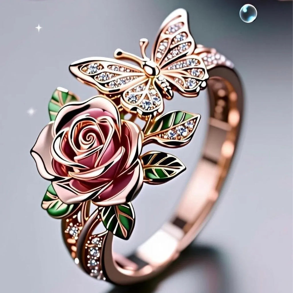 Adjustable alloy butterfly personality ring with dripping oil colour treatment showing fairy style flower and insect details