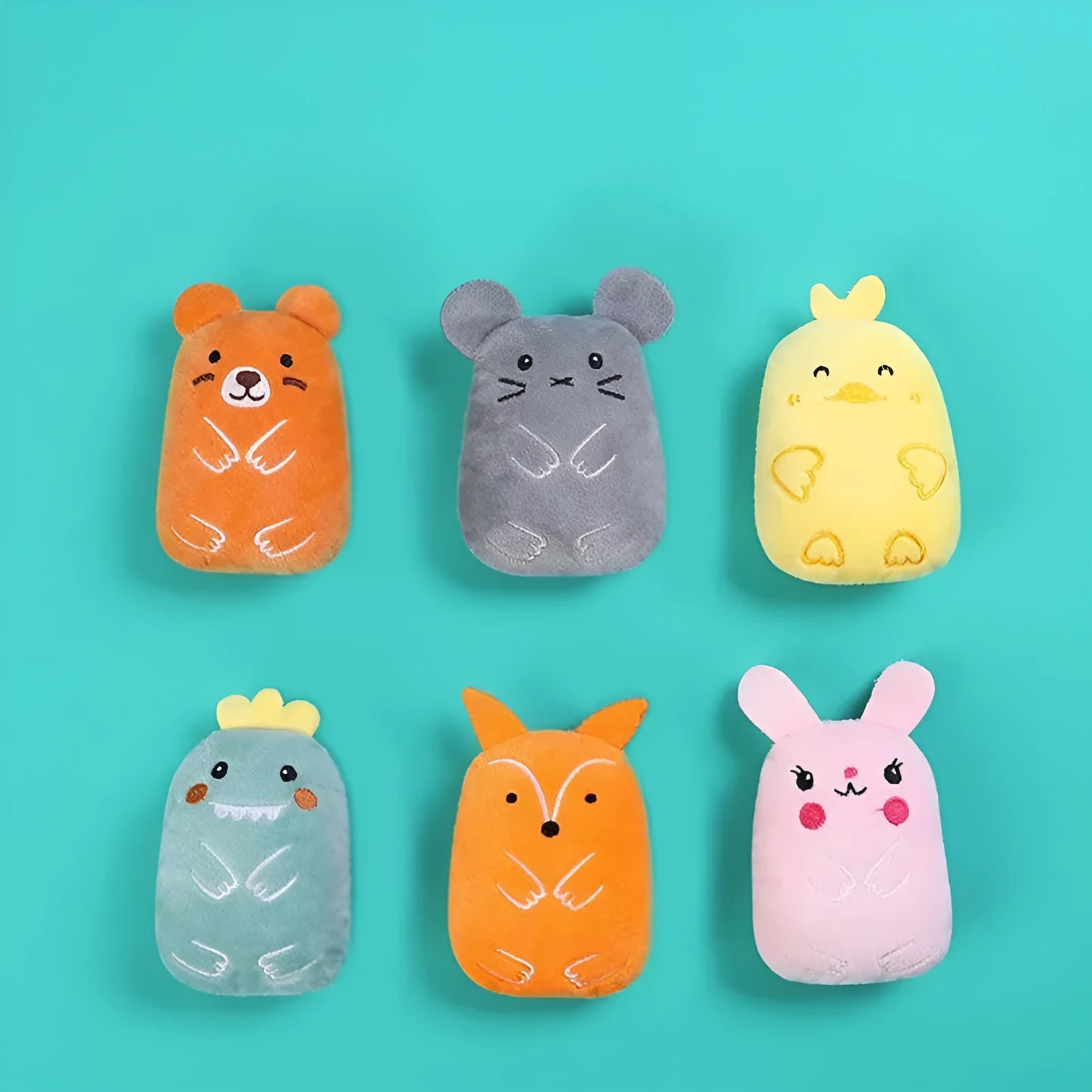 Four catnip plush toys with squeakers for chewing and interactive play