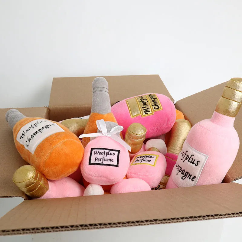 Soft green plush pet toy shaped like a wine bottle for cats and dogs to play with.
