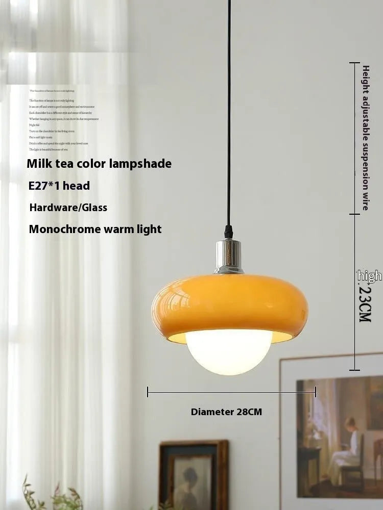 Bauhaus style three headed egg tart pendant light with glass shades in milky white finish