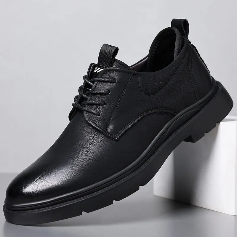 Men's black and brown two-layer cowhide business shoes with rubber soles and sewn detail