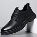 Men's black and brown two-layer cowhide business shoes with rubber soles and sewn detail