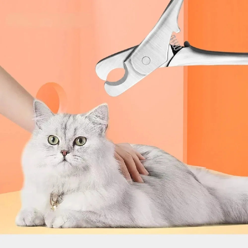 Professional stainless steel pet nail clipper with safety stop guard and finger ring for dog and cat grooming.