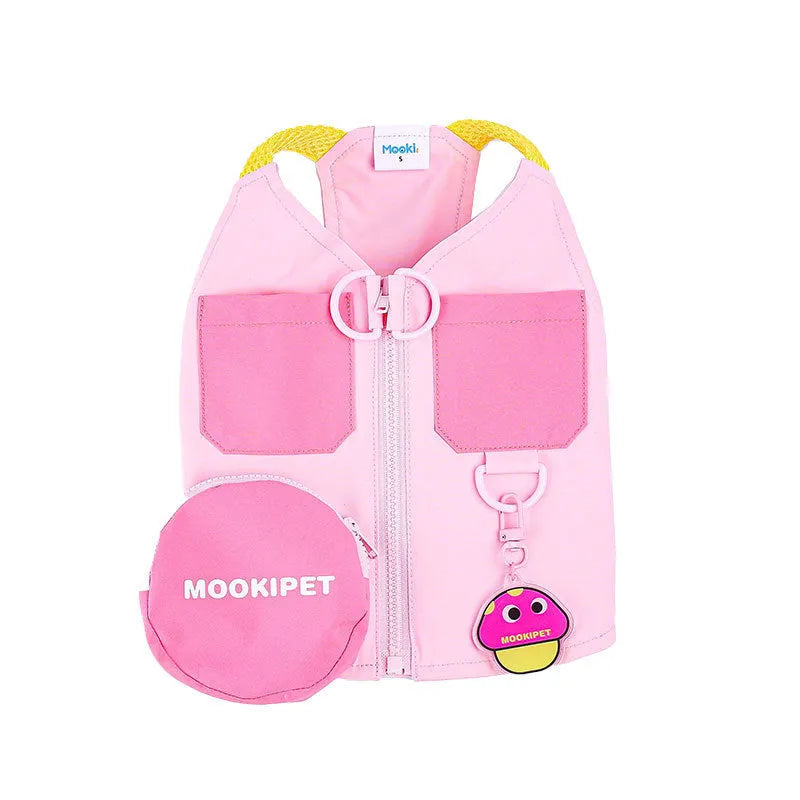 Pink polyester pet vest for small to medium dogs on a Bichon Frise
