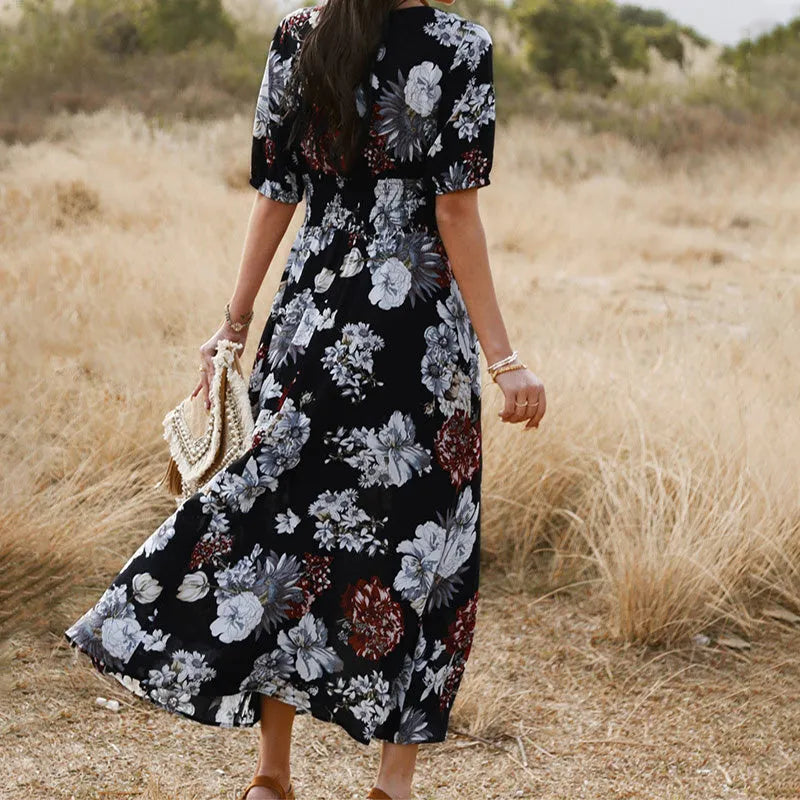 Yellow floral print women's summer dress with V-neck, short sleeves, and elasticated waist.