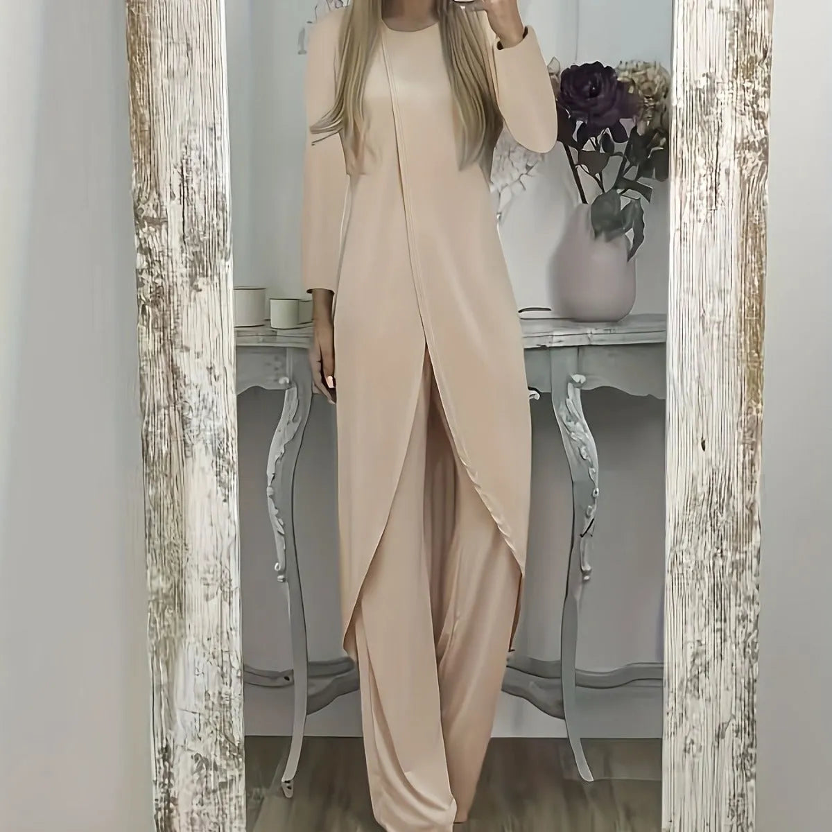 Black casual polyester two-piece tracksuit with long sleeves and trousers on a hanger