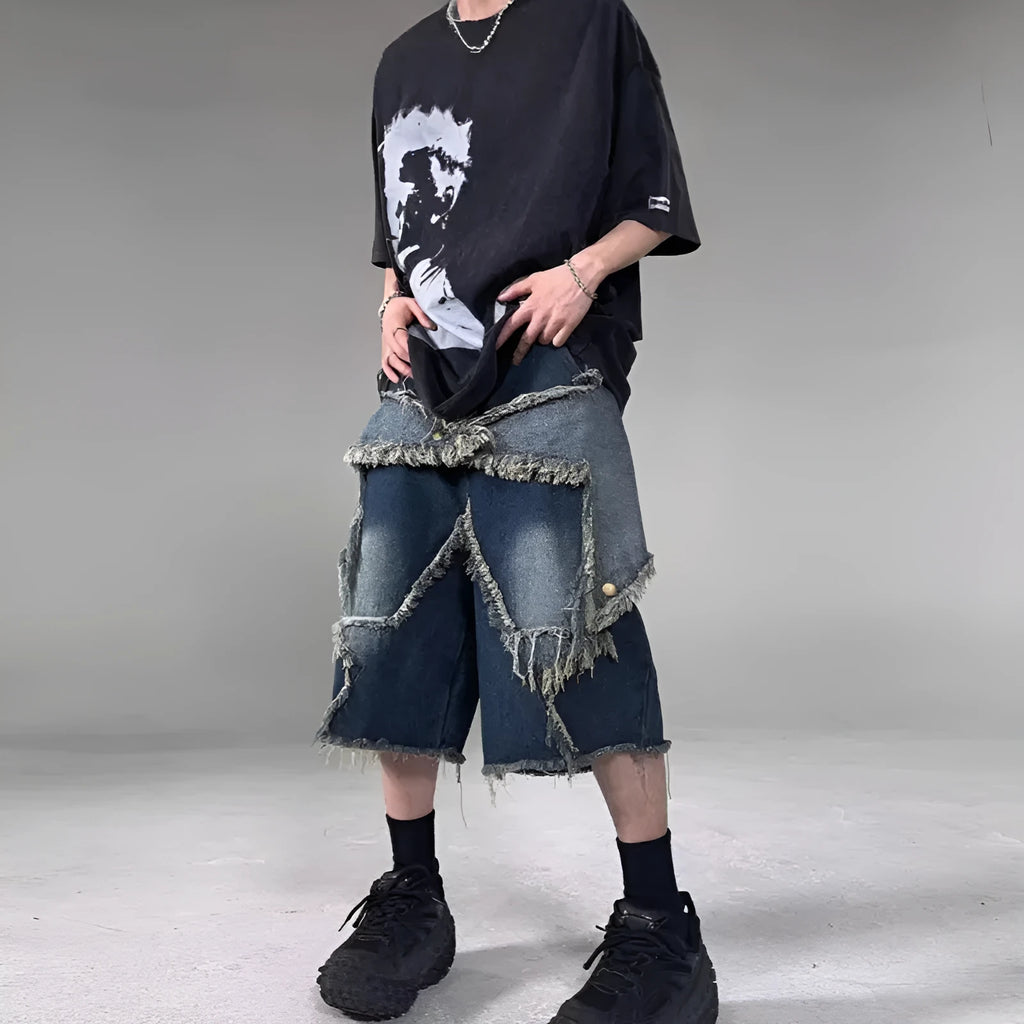 Blue men's loose-fit denim shorts with a frayed five-pointed star detail on the leg, showing American retro style.