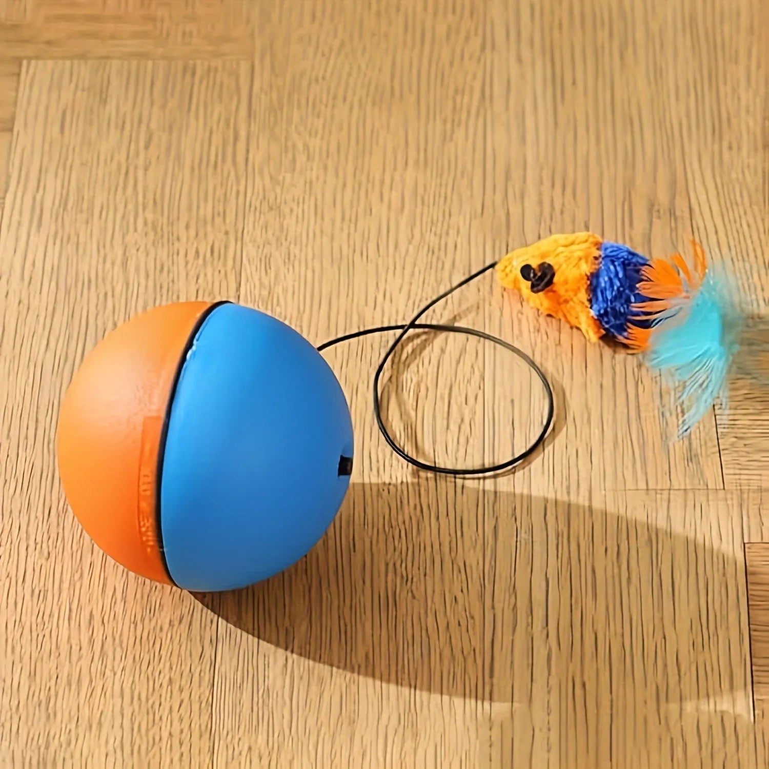 Blue and orange interactive cat toy ball with plush mouse design measuring 8.5cm diameter