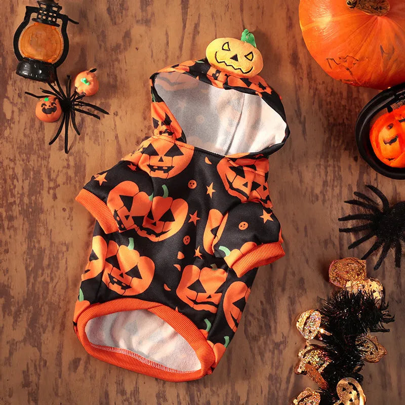 Orange crystal velvet Halloween pumpkin skirt costume on a small dog, with size chart showing measurements.