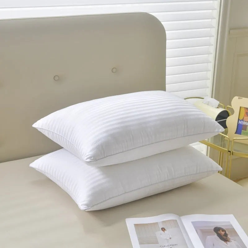 White hotel cotton satin stripe pillow core with feather and cotton filler shown in three size options.