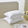 White hotel cotton satin stripe pillow core with feather and cotton filler shown in three size options.