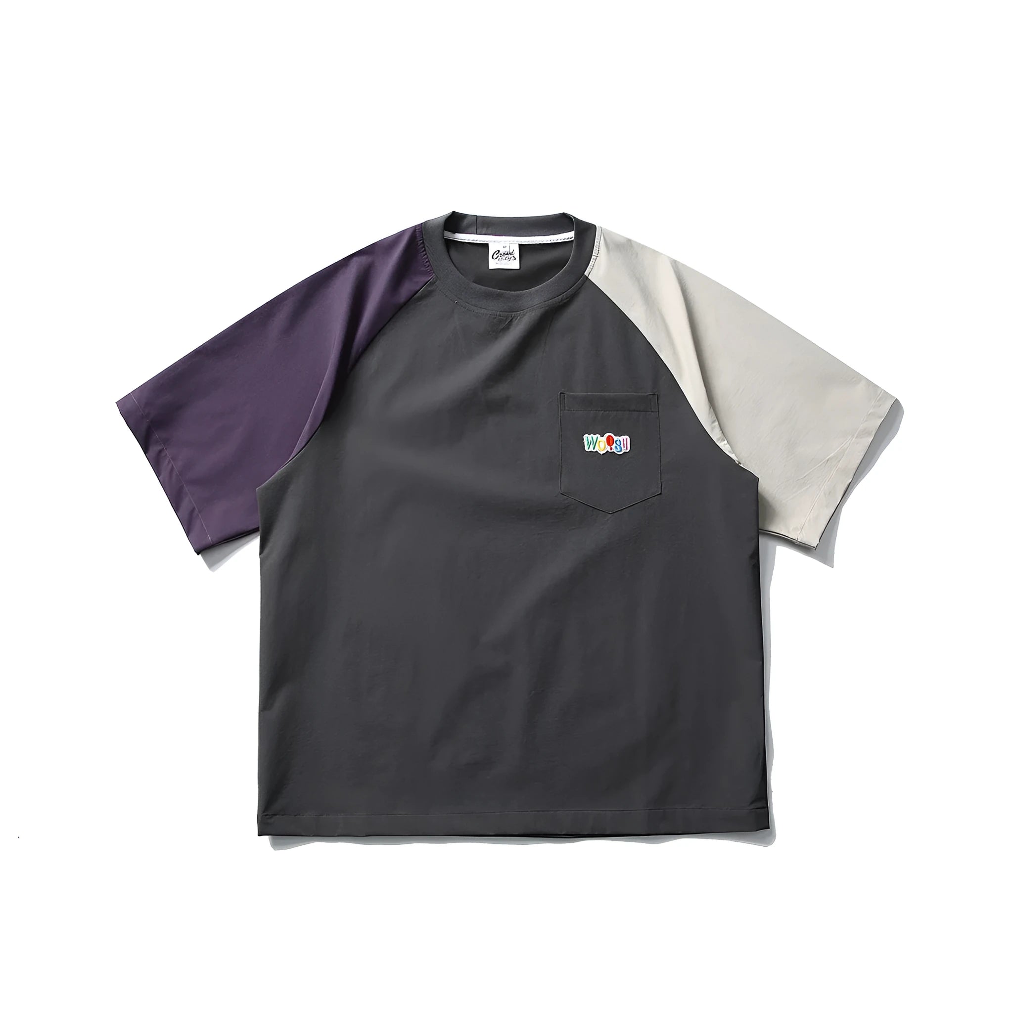 Dark grey loose fit T-shirt with contrasting colour raglan short sleeves on a hanger