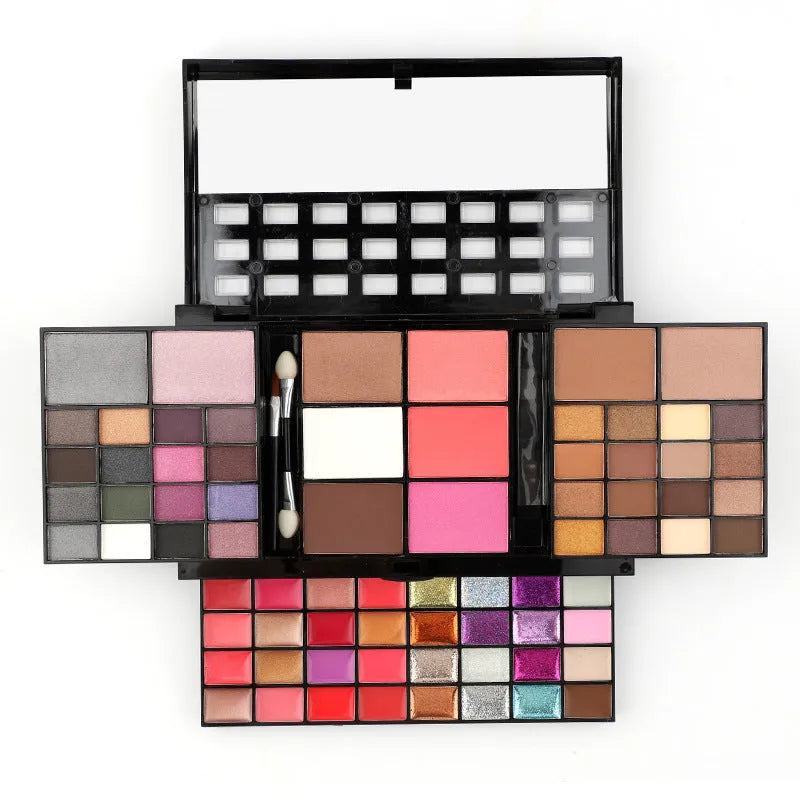 74 colour makeup combination palette open showing four layers of eyeshadows, lip glosses, and face powders with applicators