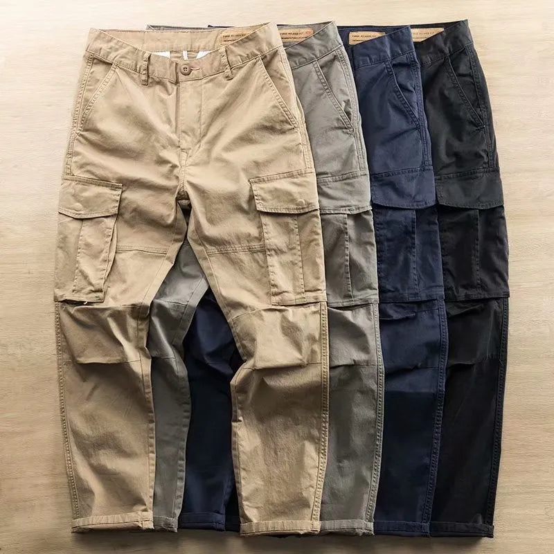 Men's multi-pocket cotton work trousers in cropped length showing cargo pocket design