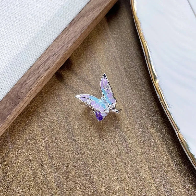 Adjustable copper insect motif ring with oil-drip finish in three colour options