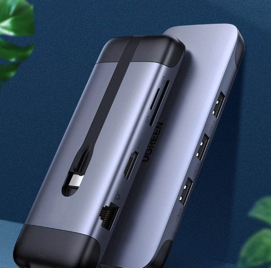 USB-C dock expansion adapter showing HDMI, USB 3.0, and Power Delivery ports with included cables