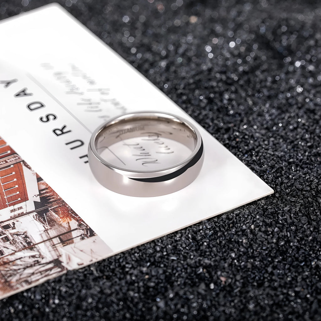 Silver titanium steel ring shown in three width options: 2mm, 4mm, and 6mm.