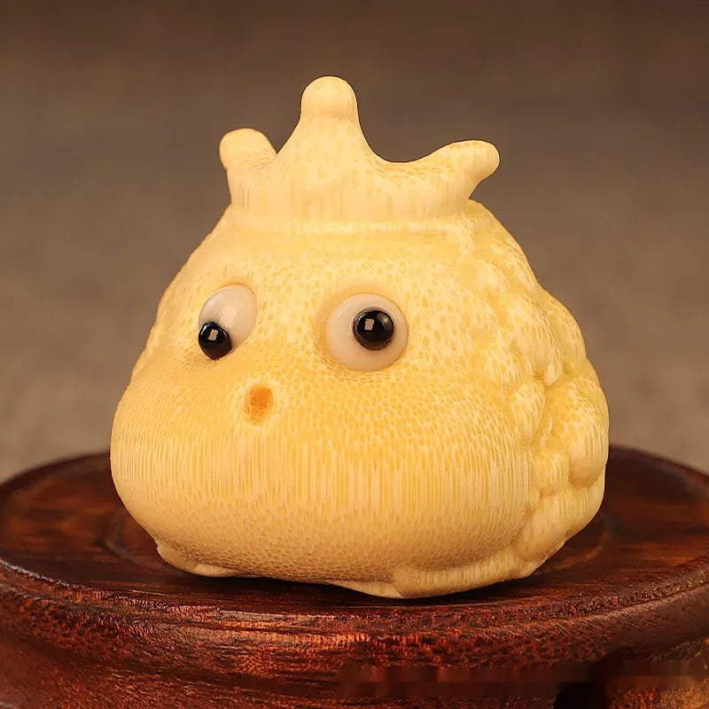 Solid bamboo carving of a Crown Princess Toad ornament with live eyes, 5.0cm.