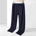 Men's loose fit ice silk straight leg trousers in solid black, light gray, and dark blue with high elastic waist.