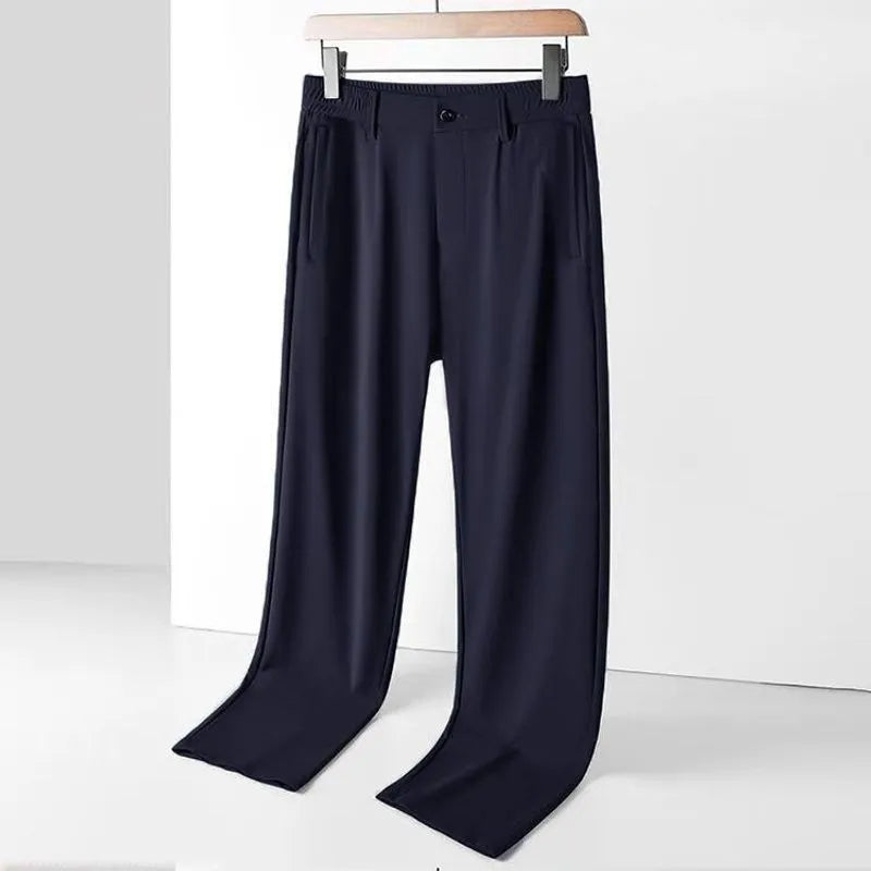 Men's loose fit ice silk straight leg trousers in solid black, light gray, and dark blue with high elastic waist.
