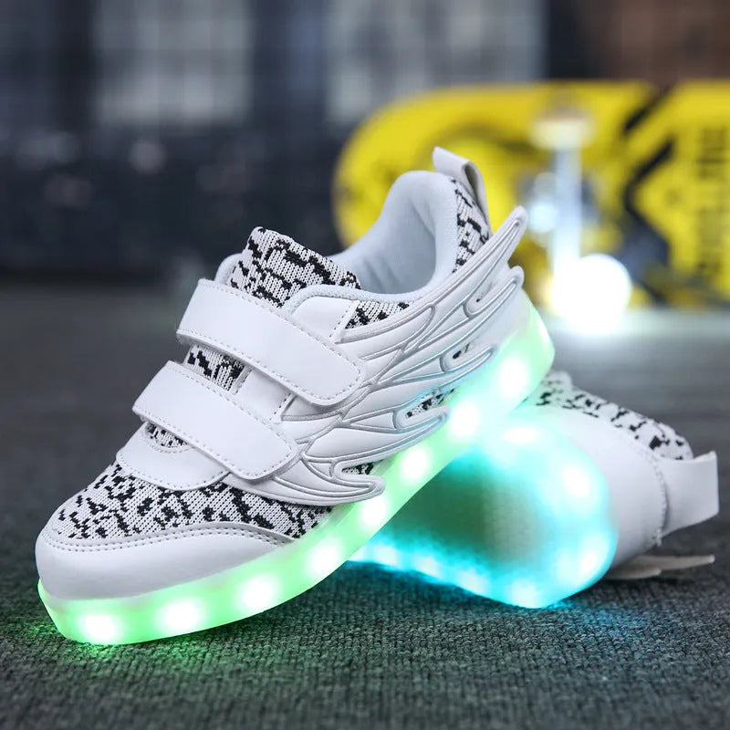Child wearing plum red USB-rechargeable LED light up sneakers with colourful flashing lights.