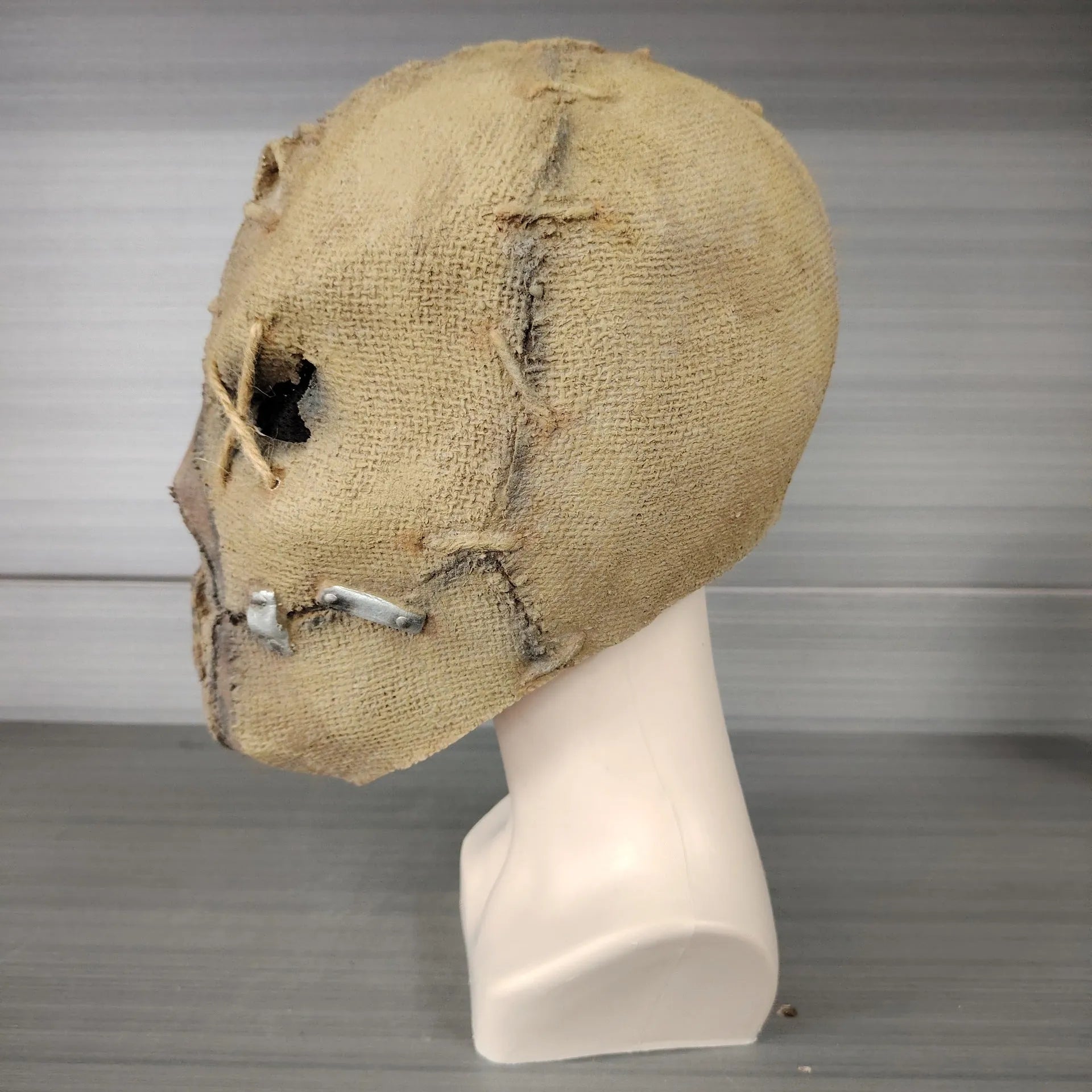 Latex scar skull horror mask showing full facial coverage design for Halloween costumes