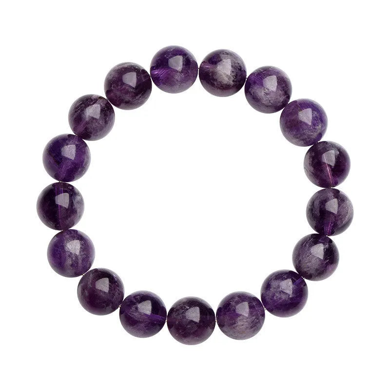 Natural feather amethyst purple crystal bracelet with geometric beads and Ruyi symbol on a white background.